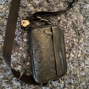 Black embossed Coach crossbody